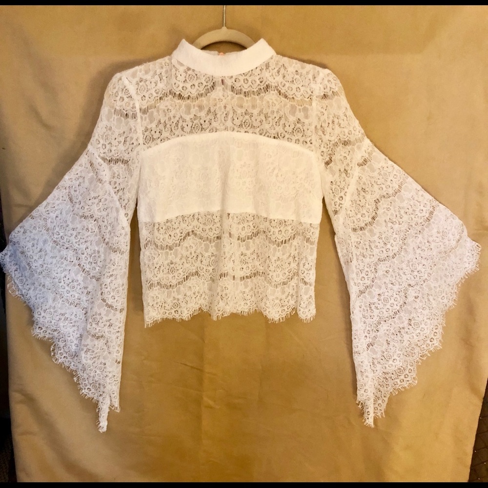 Gorgeous big sleeve lacy top by DO + BE